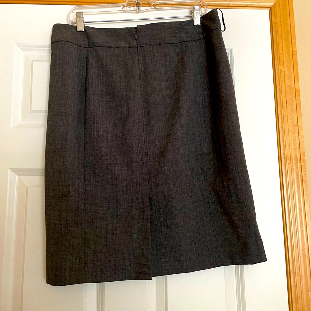 Gray professional skirt with slit in back.
